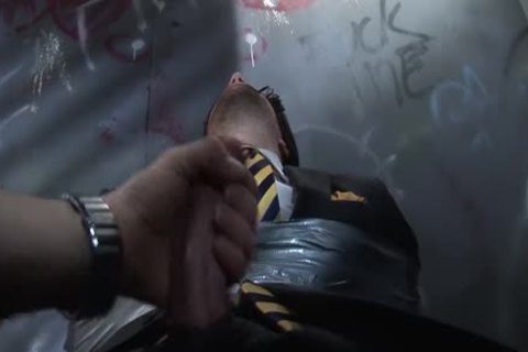 Suited Woody Fox fastened And Gagged And Jerked Off