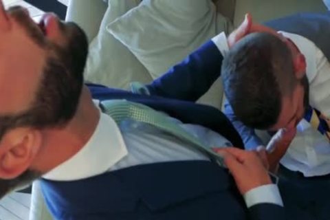 2 Suited guys plowing